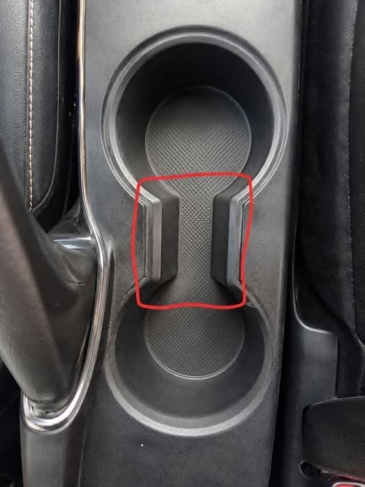 What Is the Weird Gap Between Car Cup Holders For? (And Why It’s Actually Brilliant)